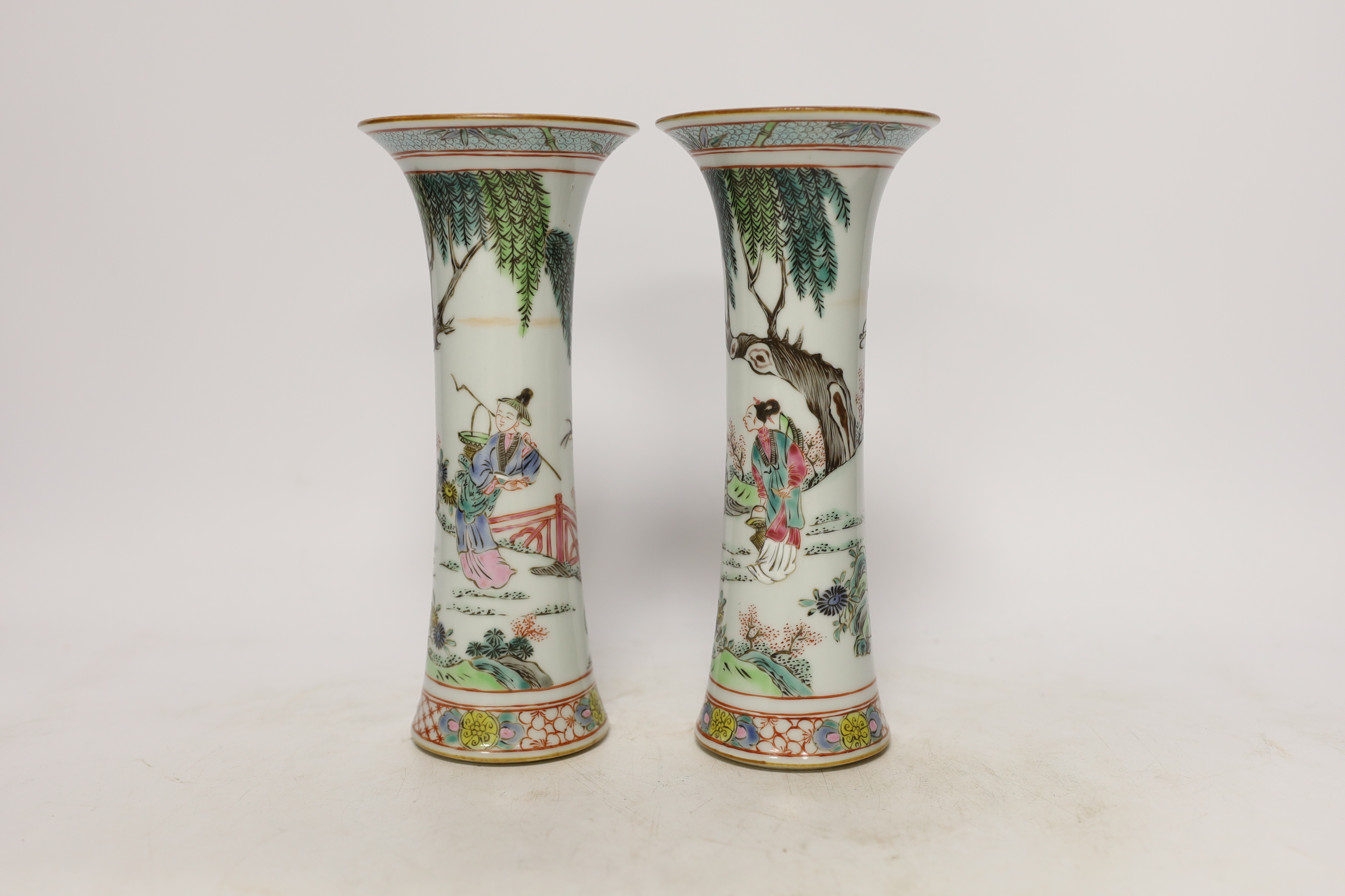A pair of Chinese famille rose vases, 21cm